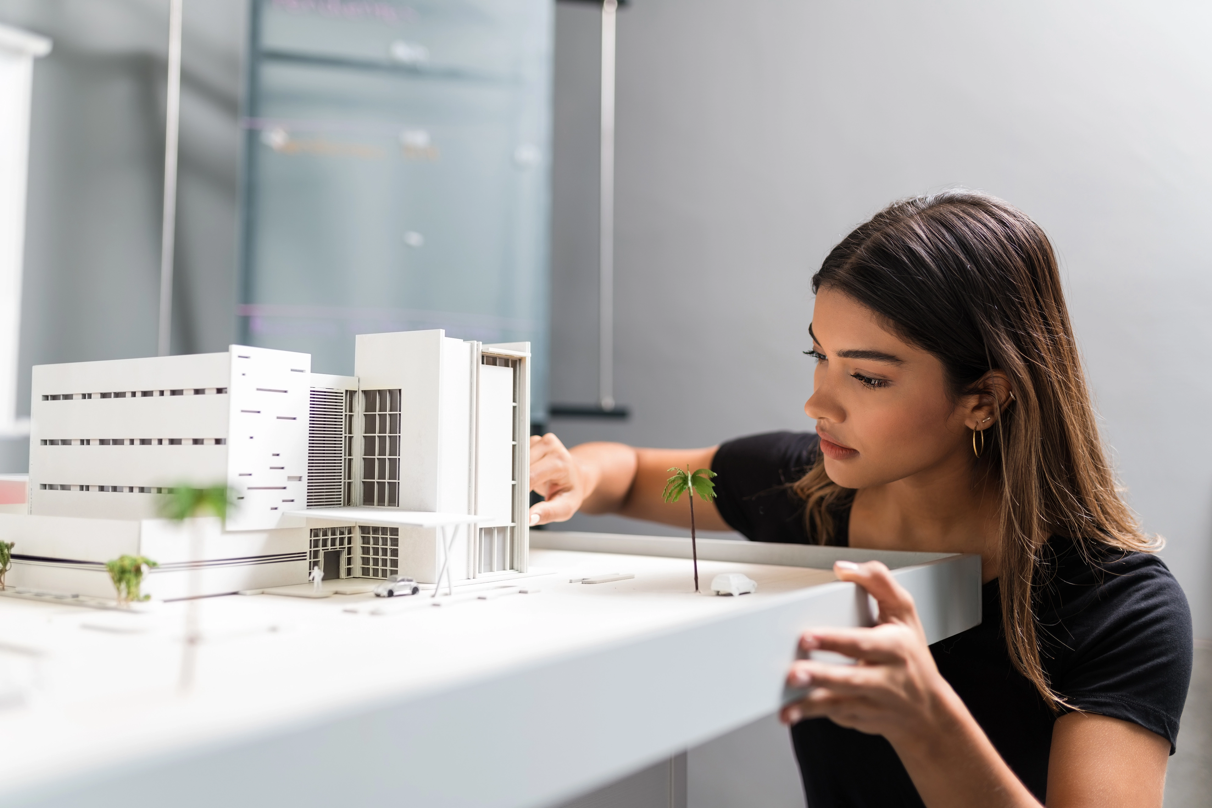 architect-working-over-model-in-office-2025-04-28-19-13-33-utc copy