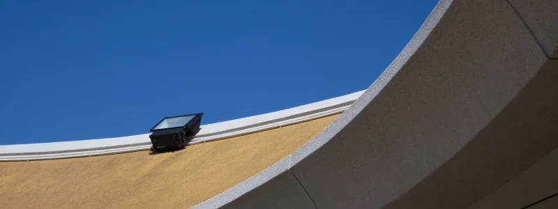 spotlight-on-top-of-modern-roof-in-curve-pattern-a-2025-03-10-17-27-29-utc copy